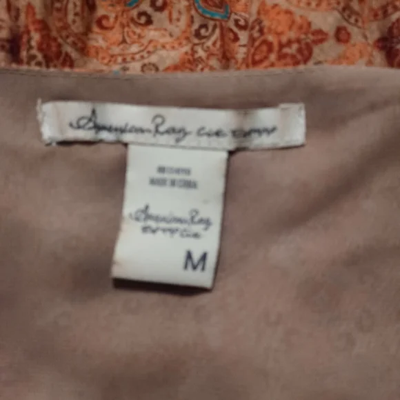 American Rag dress. 💯 Rayon (outer). 💯 polyester (lining). - Picture 5 of 6